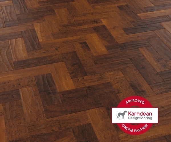 Wooden floor with herringbone pattern and Karndean Designflooring logo.