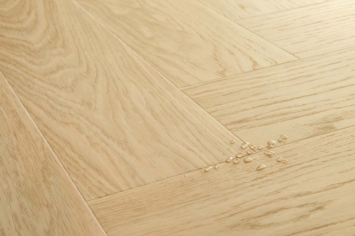 Quick-Step Ciro Pure Oak Blush Herringbone Click Vinyl Built-in Underlay AVHBU40359